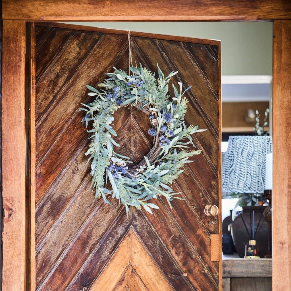 door with wreath on it